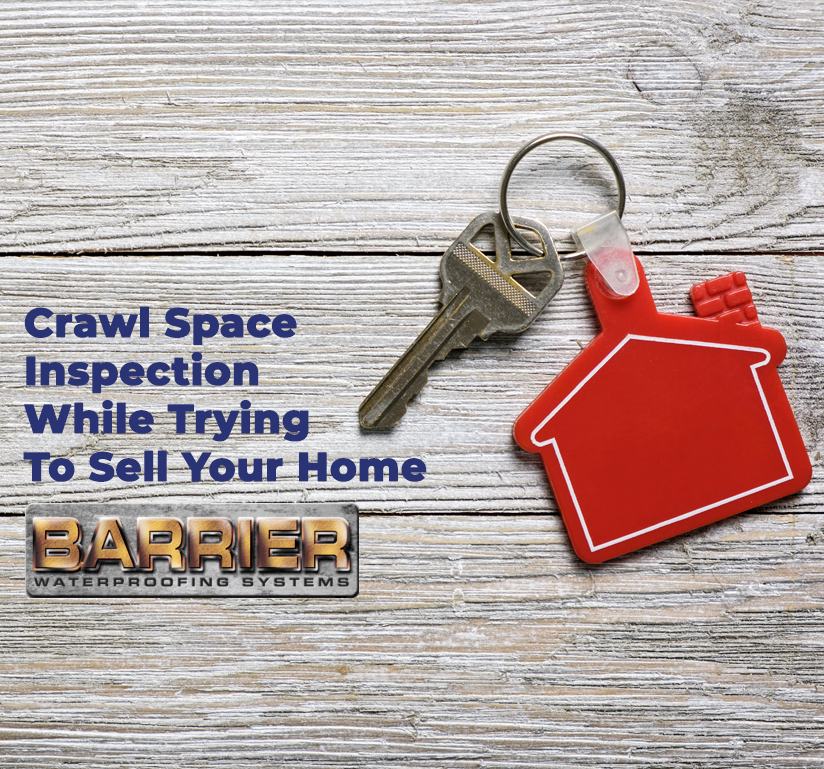 Real estate key and house symbol keychain depiction for crawl space inspection before the home selling process