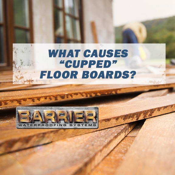 Pile of cupped flood boards imagery